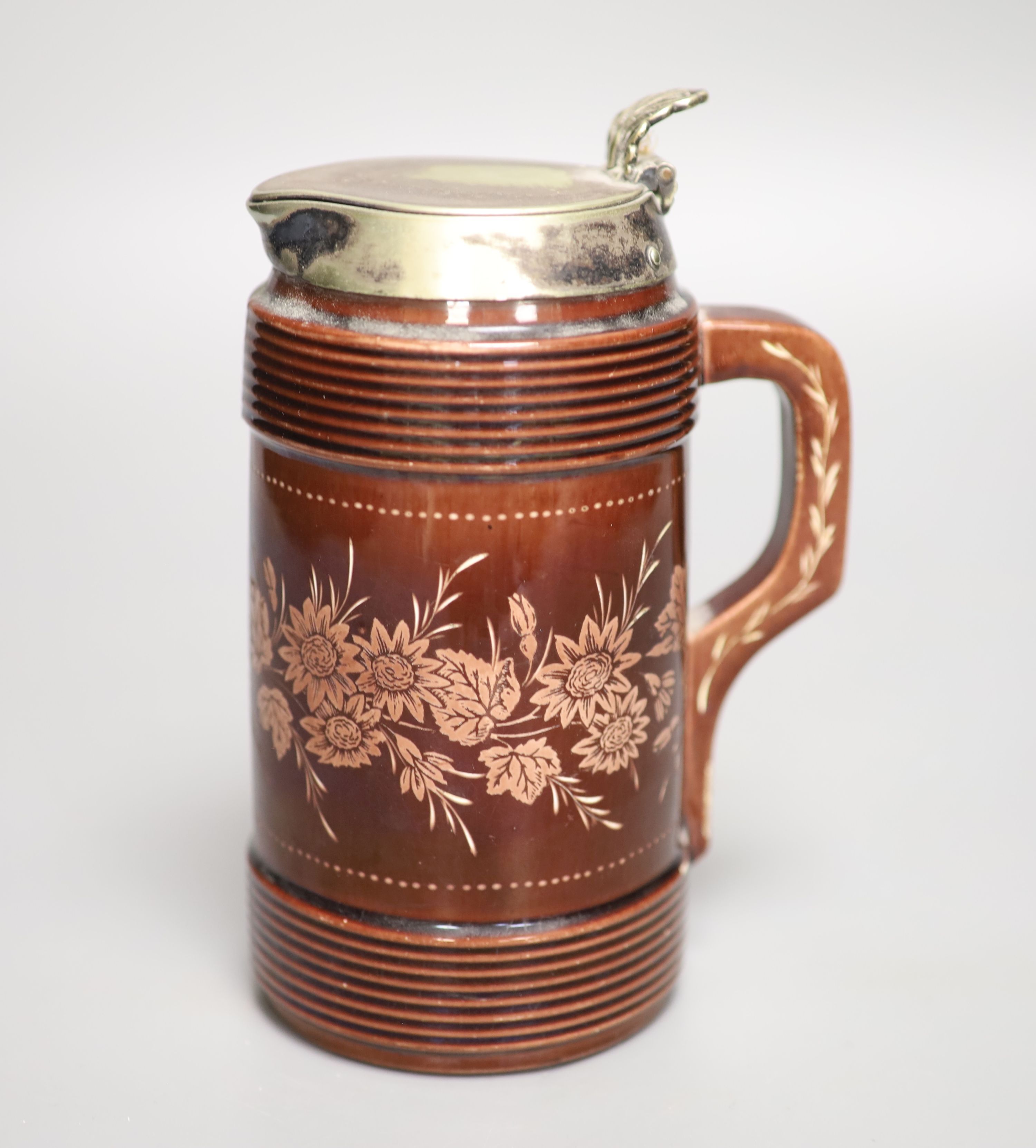 John Northwood (1837-1902) for Wedgwood . A rare wheel engraved brown glazed jug, signed, height 18cm